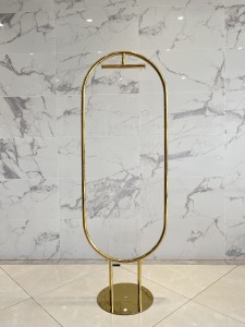 Owalny stojak złoty z wieszakiem 