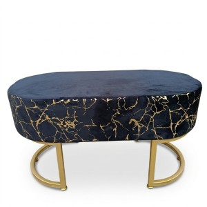 upholstered pouf in black and gold marbled pattern