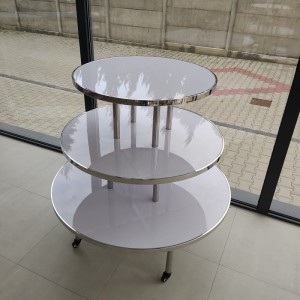 Silver triple rack on wheels